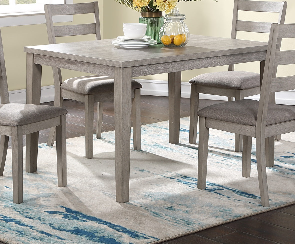 Rustic gray wash wood dining table with ladderback chairs