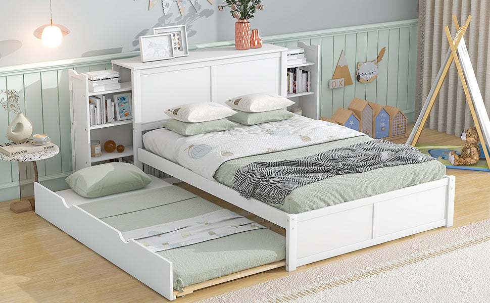 White twin size bed with pullout trundle and builtin bookshelves