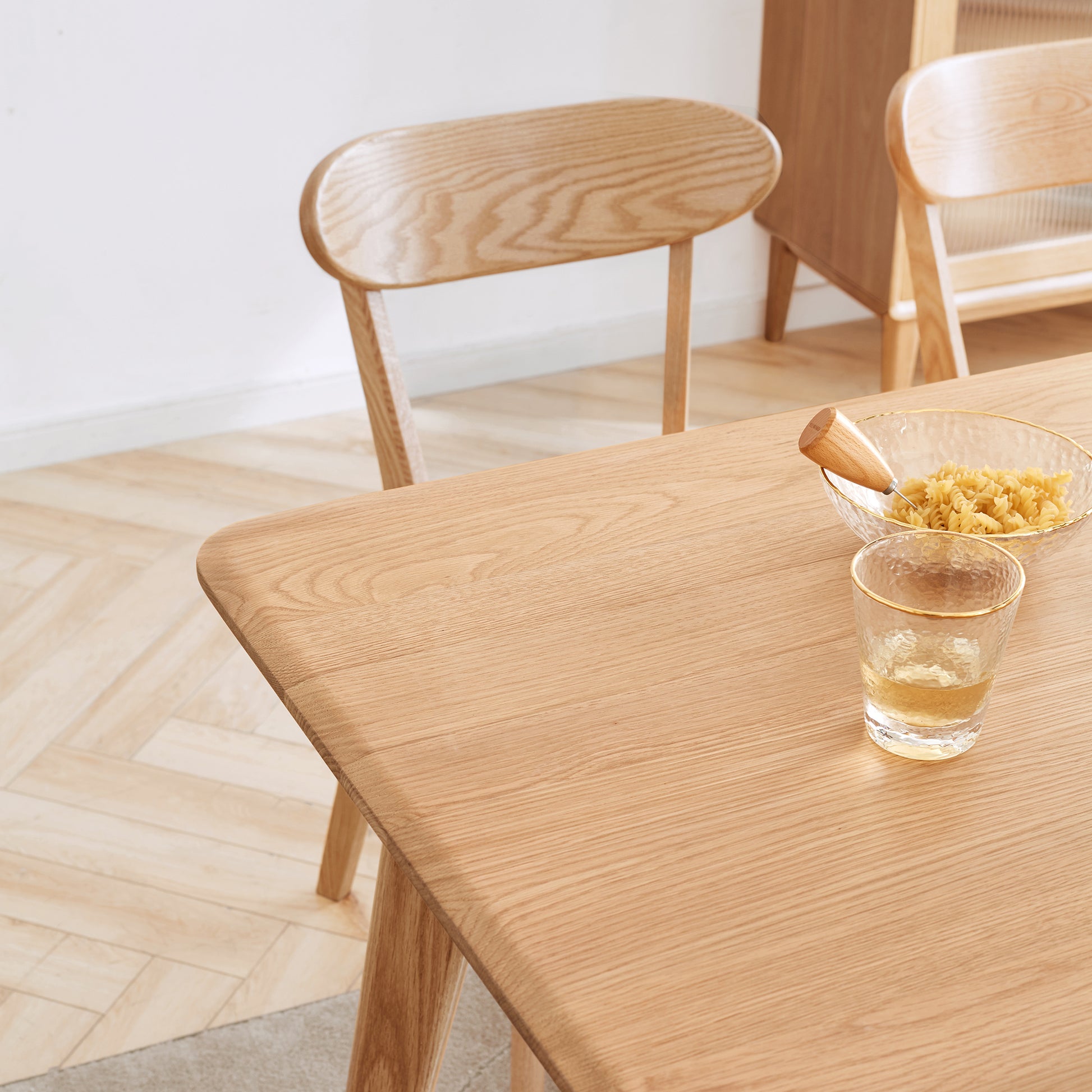 Natural oak dining table with curved edges