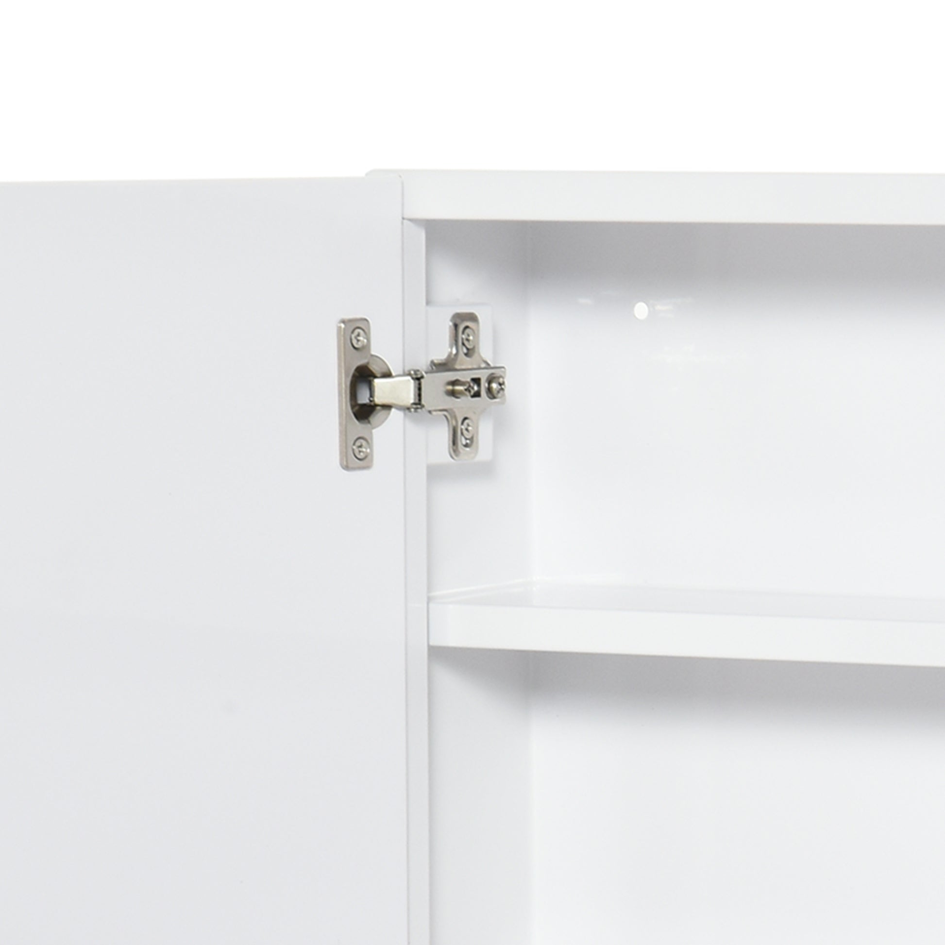 White cabinet with visible metal door hinge