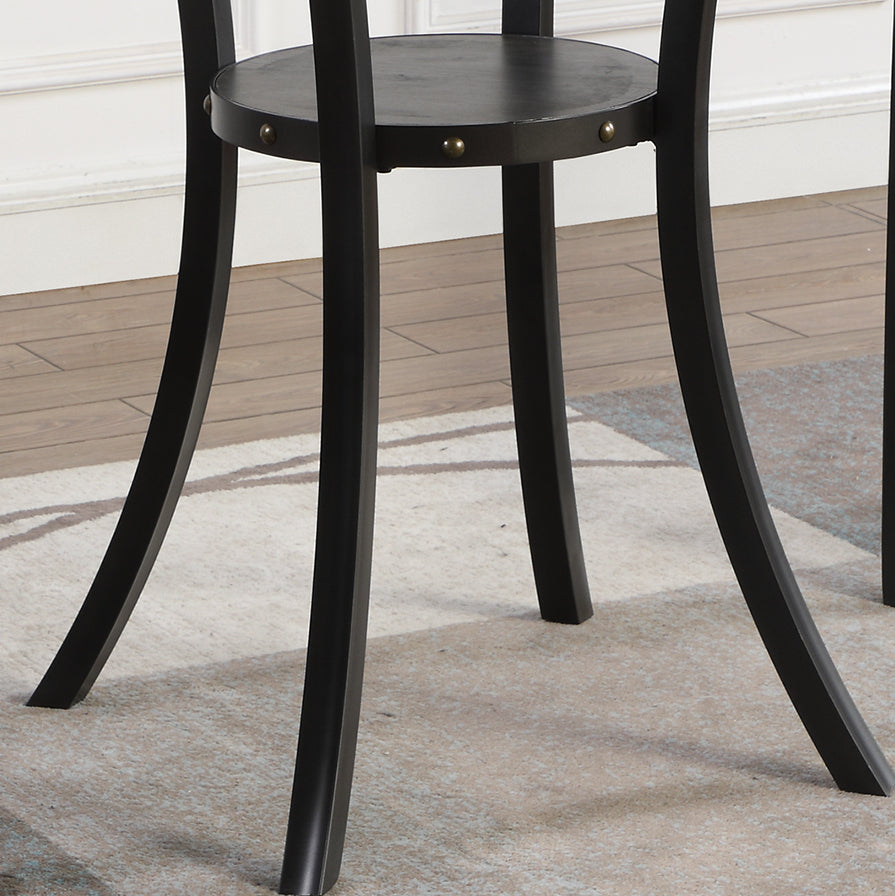 Black metal accent table legs with decorative studs on shelf