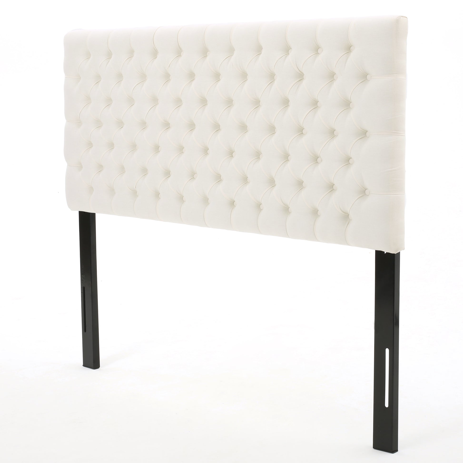 Offwhite tufted upholstered headboard with black metal legs
