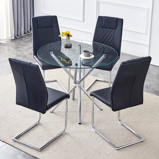 Black faux leather dining chairs with diamond tufting around glass table