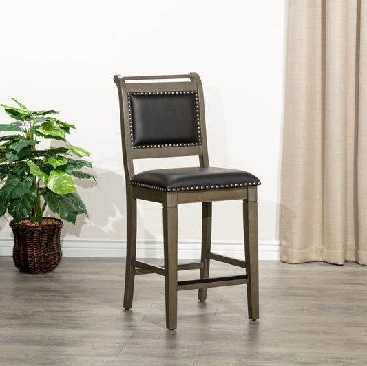 Gray wood bar stool with black faux leather seat and nailhead trim