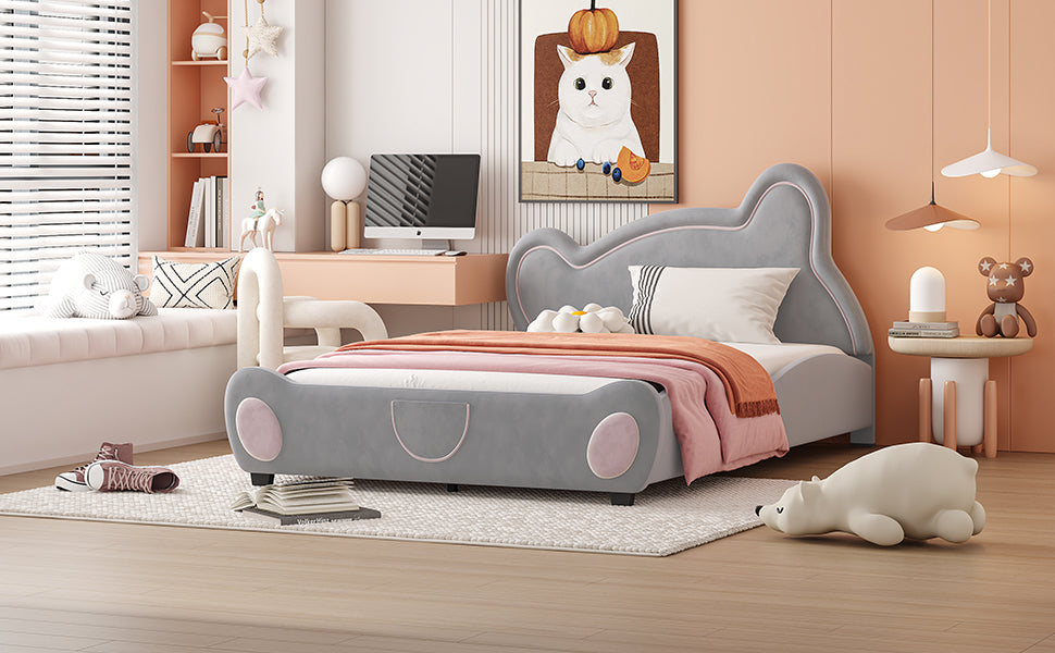Cute grey carshaped kids bed with pink accents perfect for a toddlers room