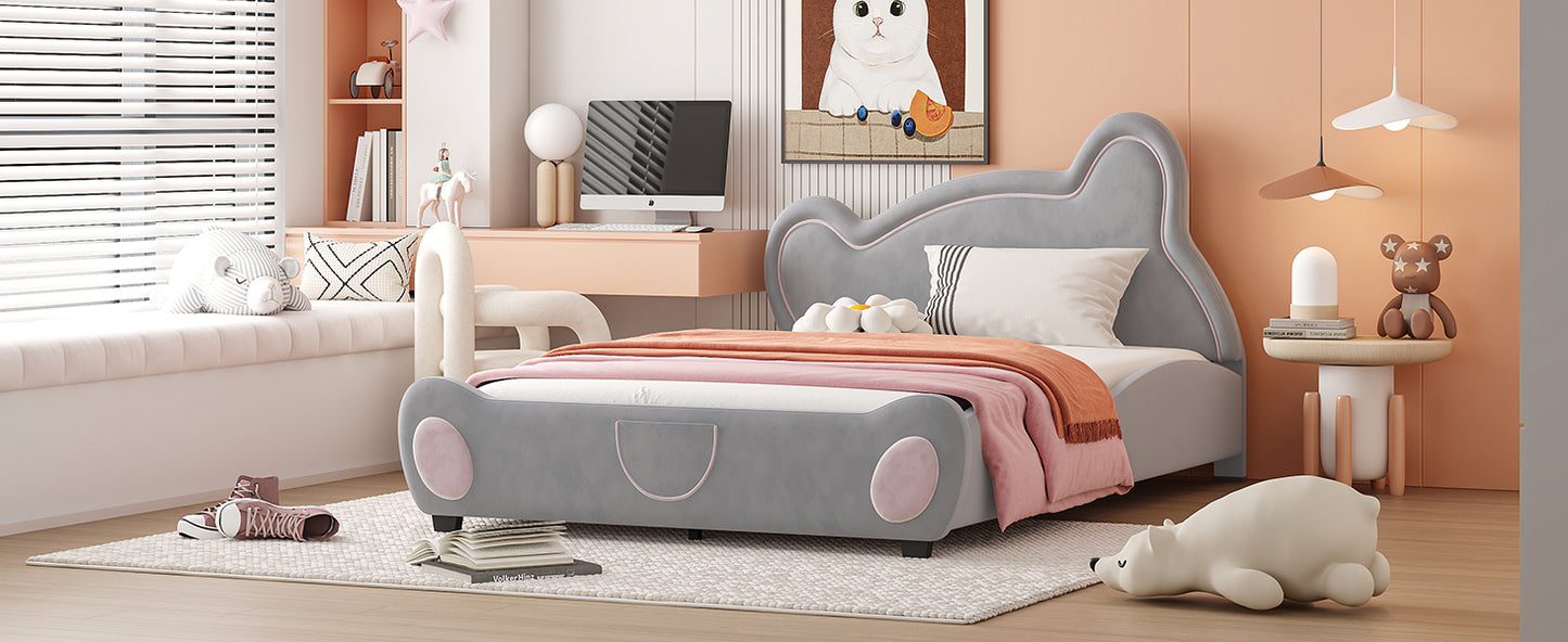 Gray velvet carshaped bed with pink accents
