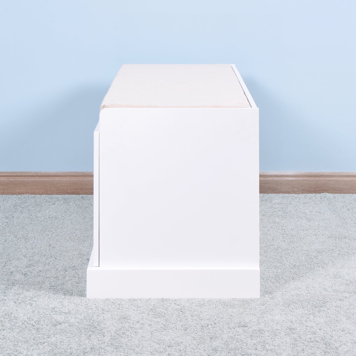 White storage bench with cushioned top for entryway seating