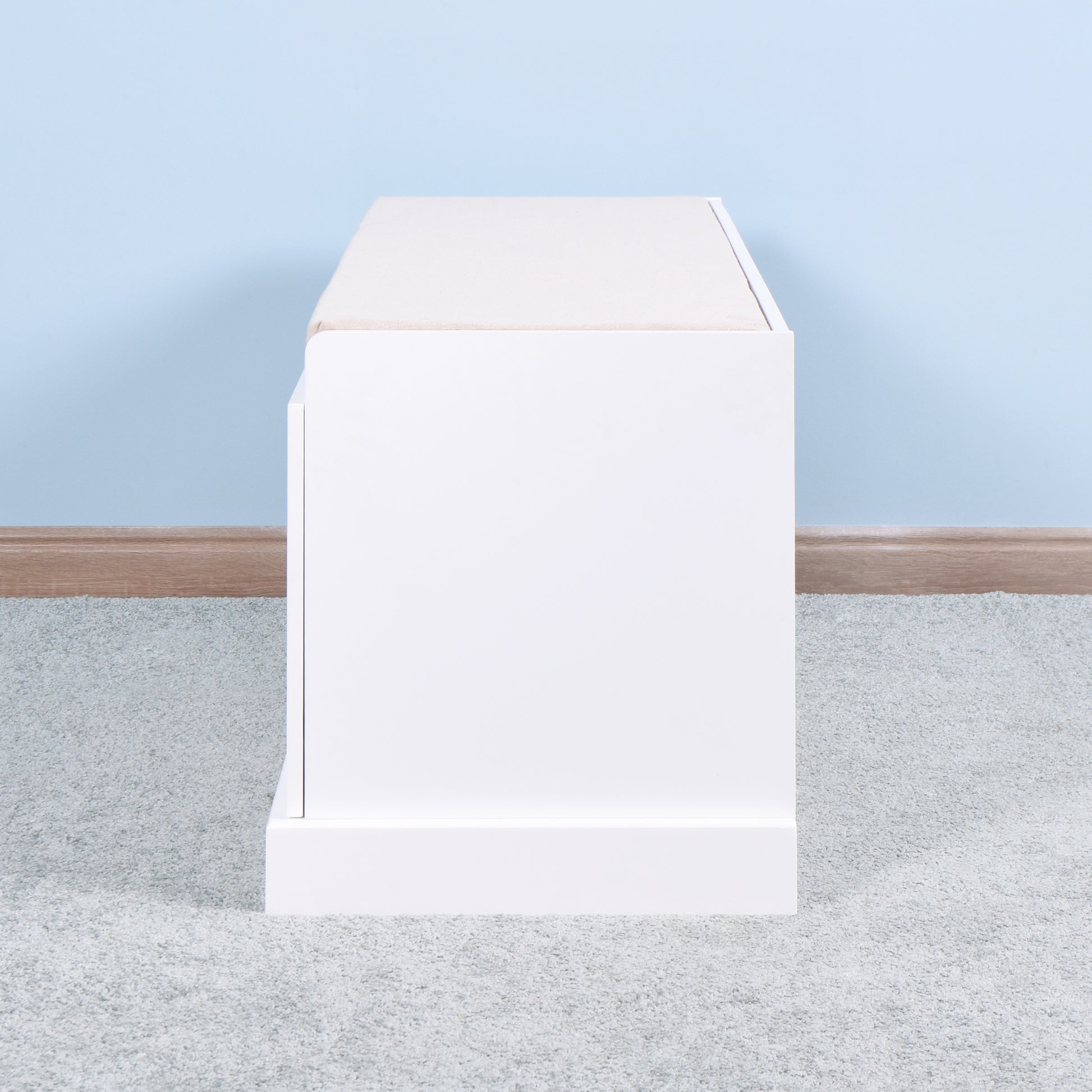 White storage bench with cushioned top for entryway seating