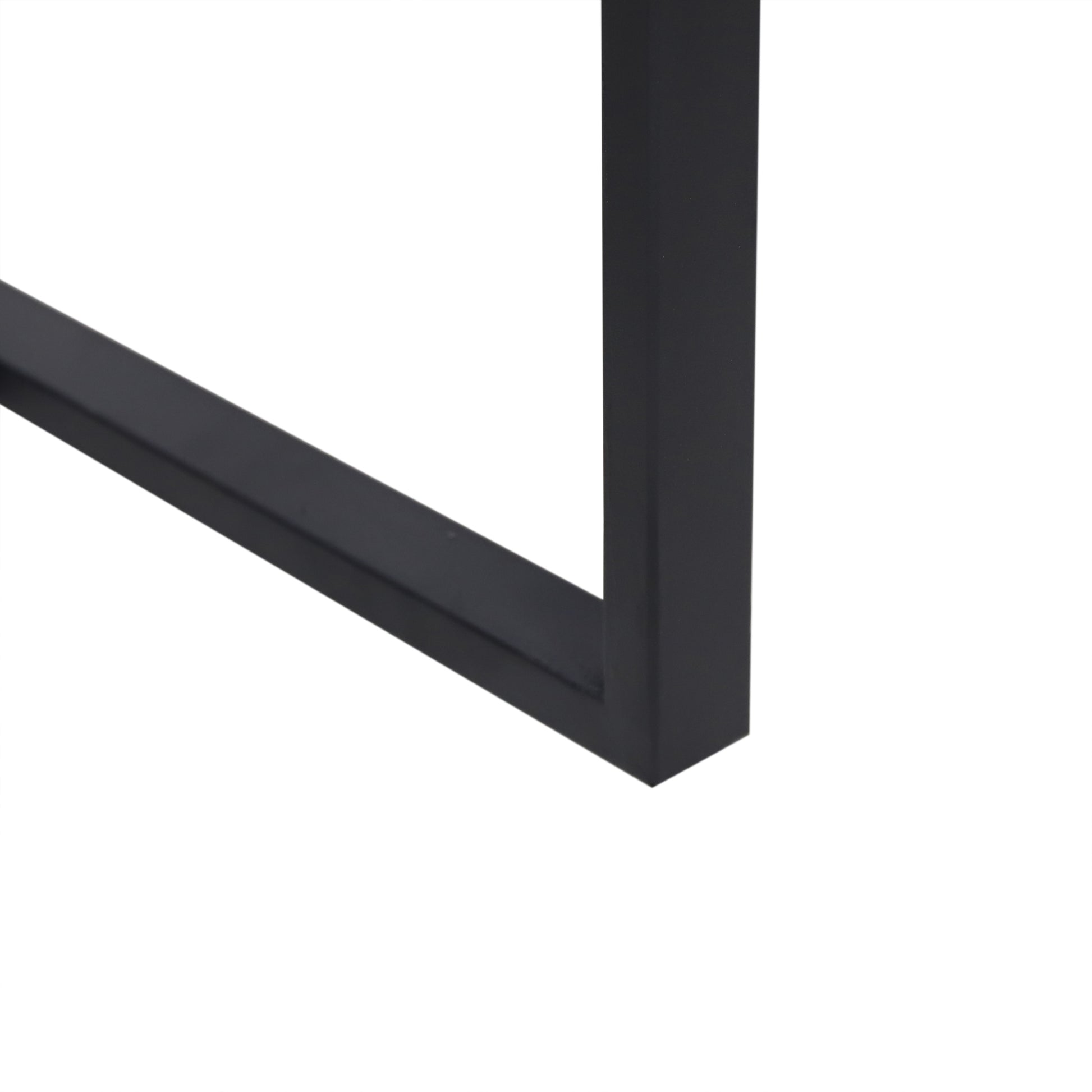 Black metal table leg detail with clean lines