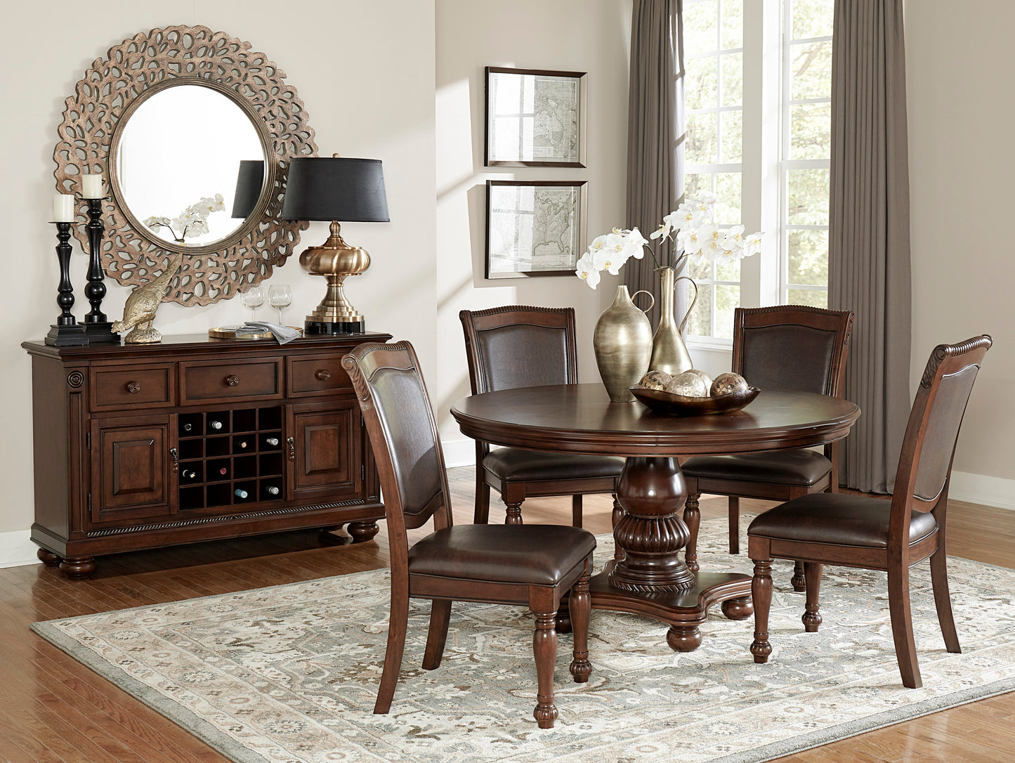 Ornate round mirror with carved frame