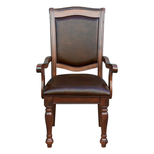 Classic dark brown leather armchair with ornate wooden trim