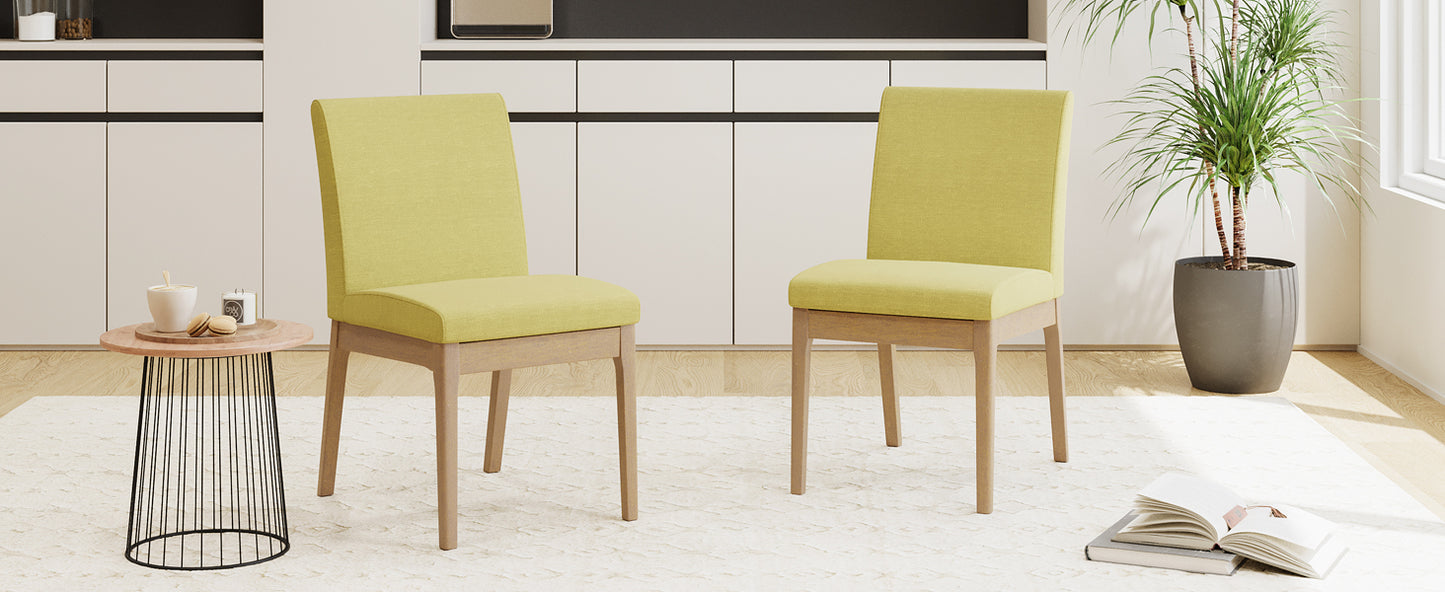 Lime green upholstered dining chair with light wood frame