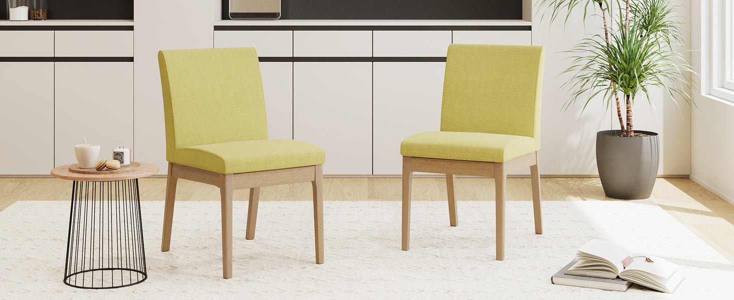 Lime green upholstered dining chair with light wood frame