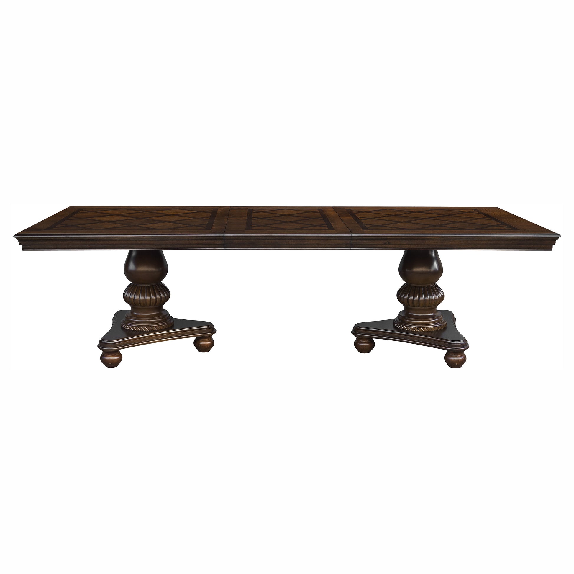 Dark wood dining table with intricate inlay pattern and ornate pedestal bases