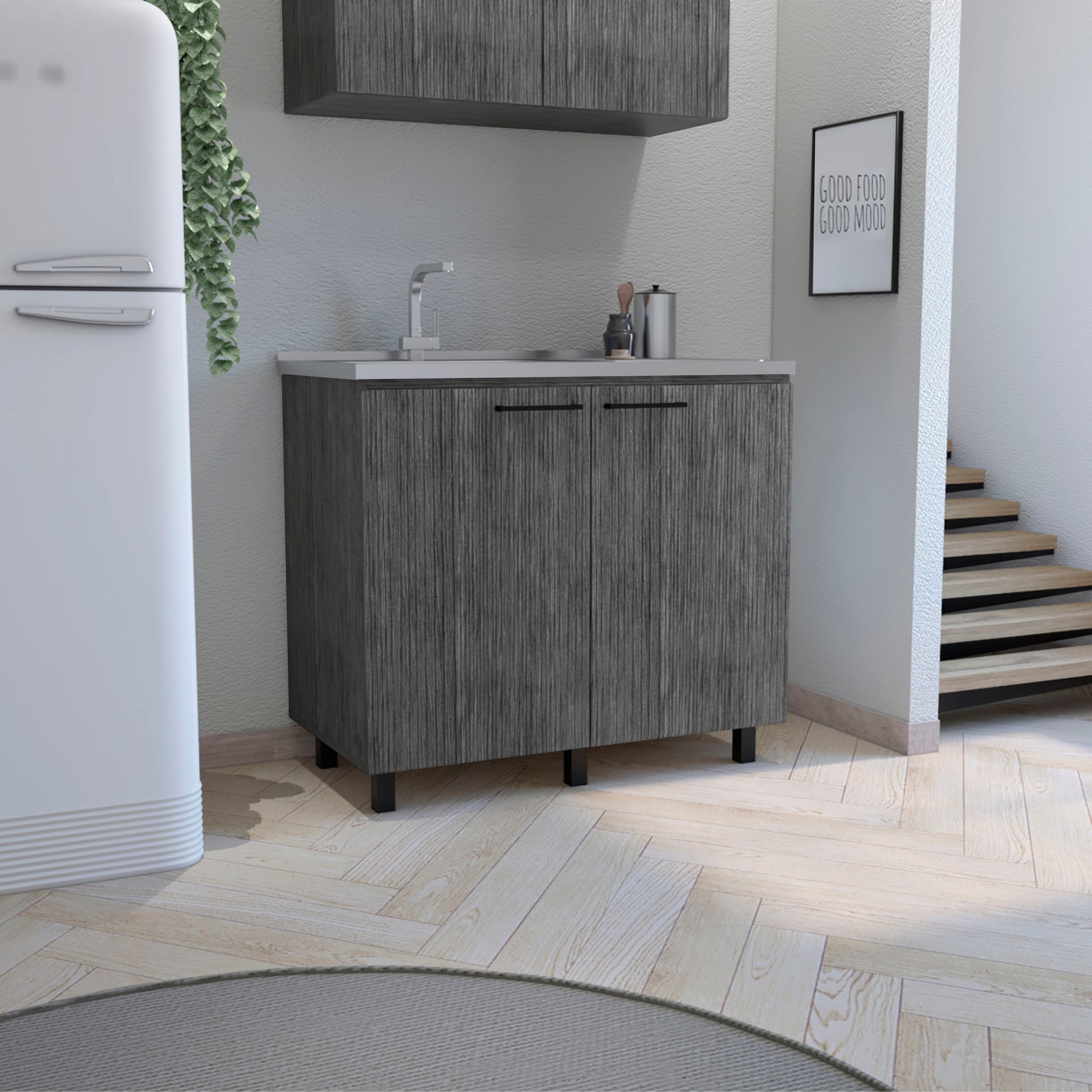 Gray wood grain twodoor kitchen base cabinet with stainless steel sink and faucet