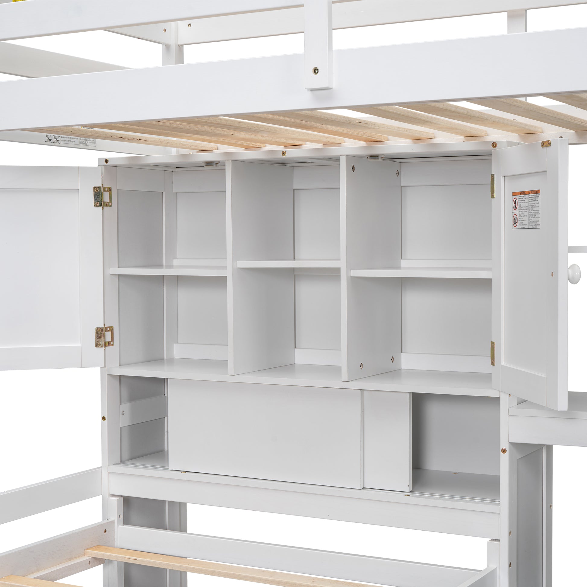 White wooden bunk bed with open shelves and cabinet doors