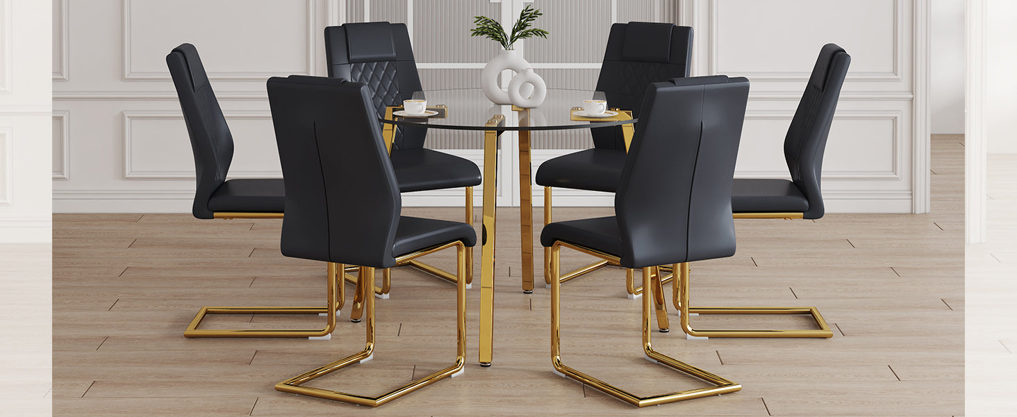 Black faux leather dining chairs with gold sled legs