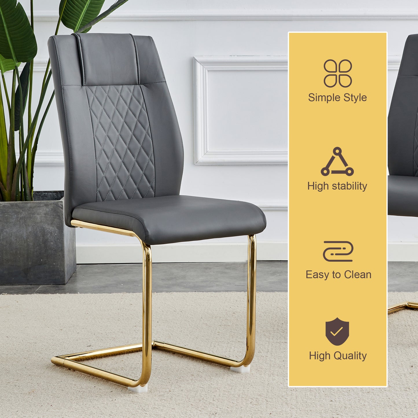Grey faux leather dining chair with diamond stitching and gold metal sled base