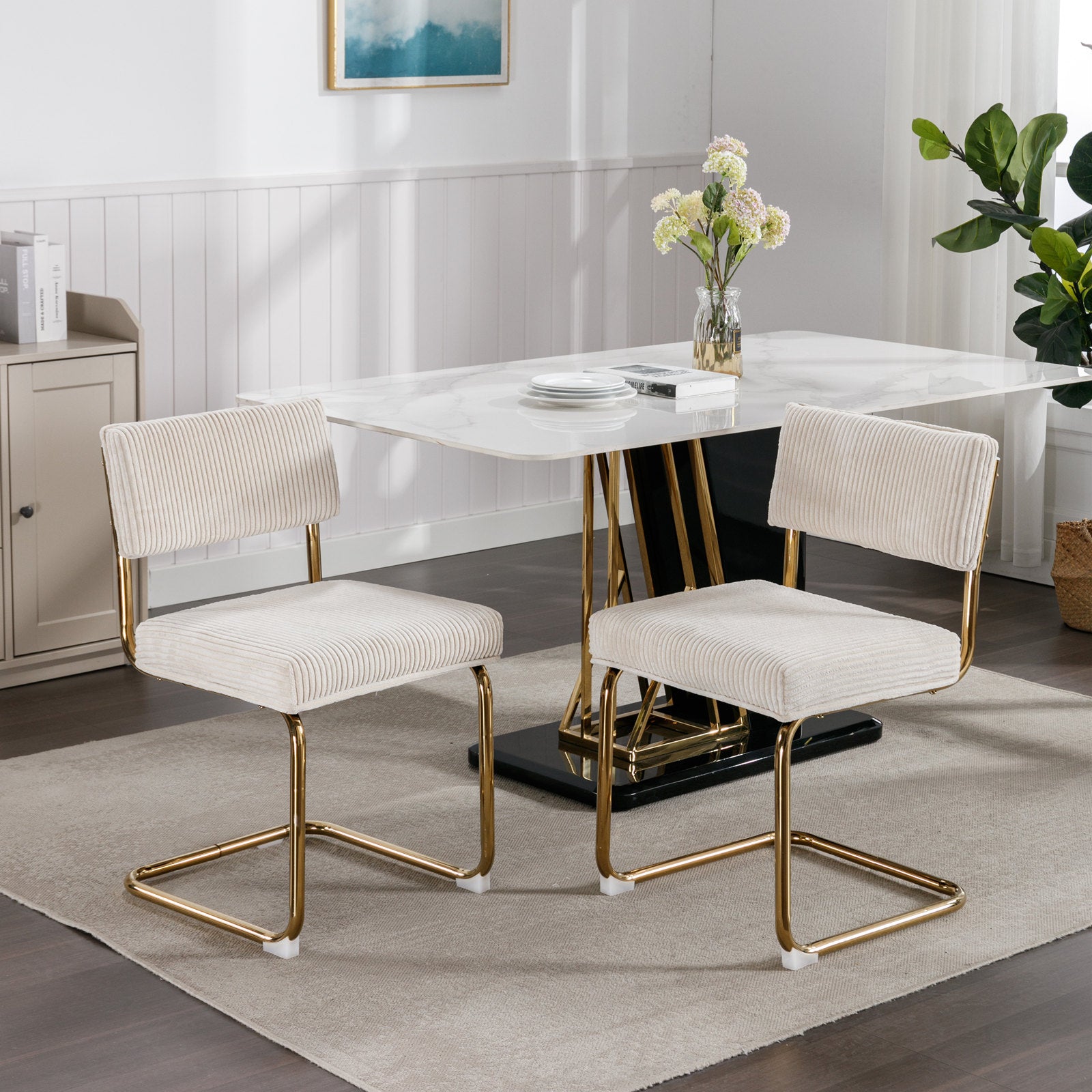 Cream corduroy dining chairs with gold metal legs