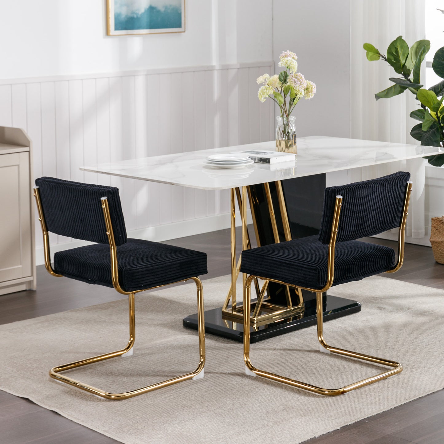 Black corduroy dining chair with gold metal legs