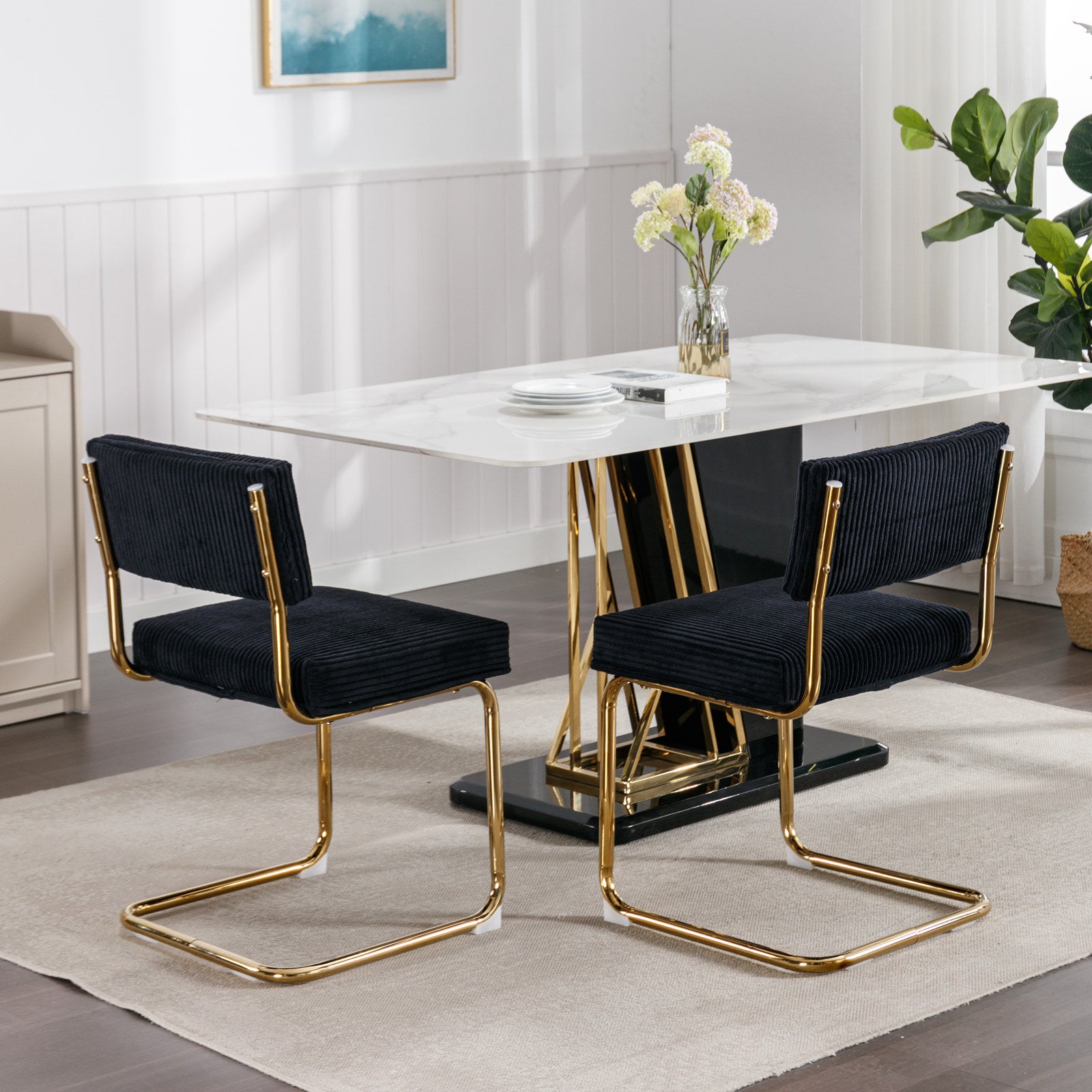 Black corduroy dining chair with gold metal legs