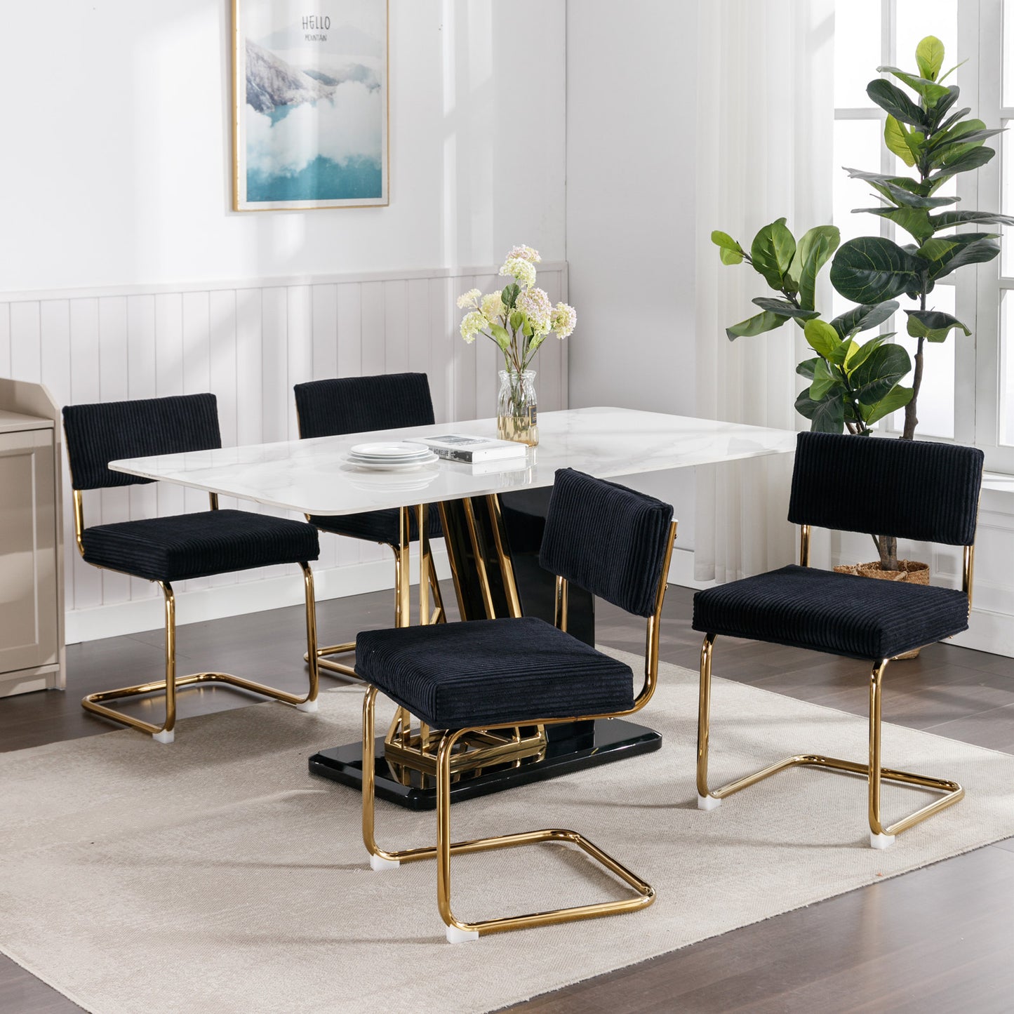 Black corduroy dining chair with gold sled base