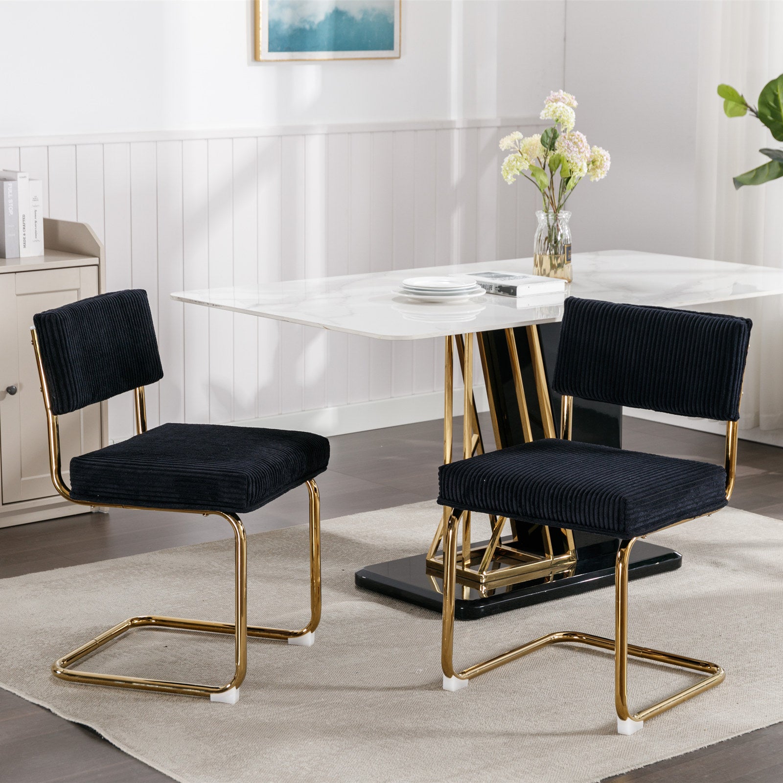 Black corduroy dining chair with gold metal legs