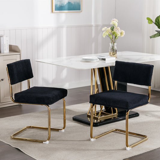 Black corduroy dining chair with gold metal legs
