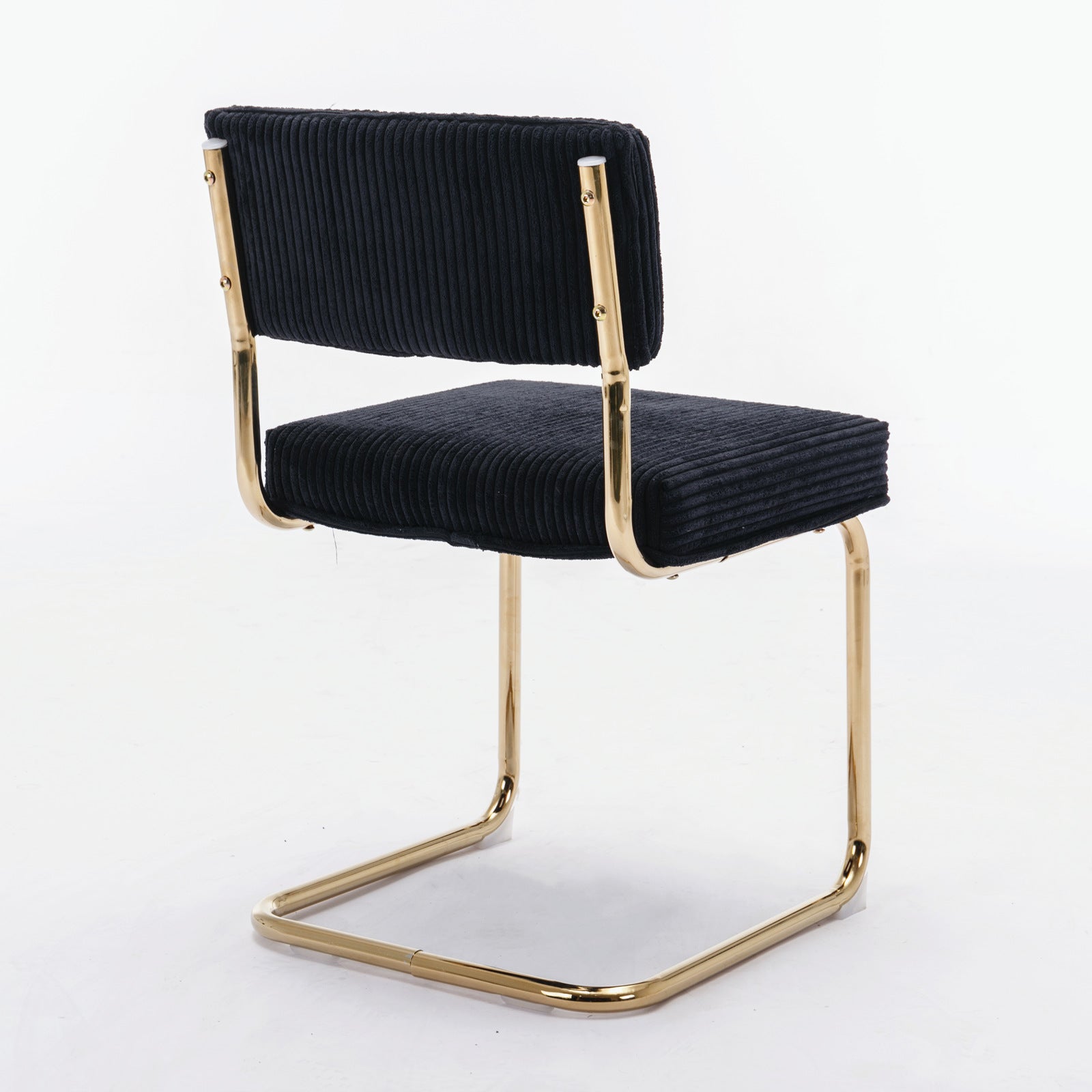 Black corduroy dining chair with gold metal frame