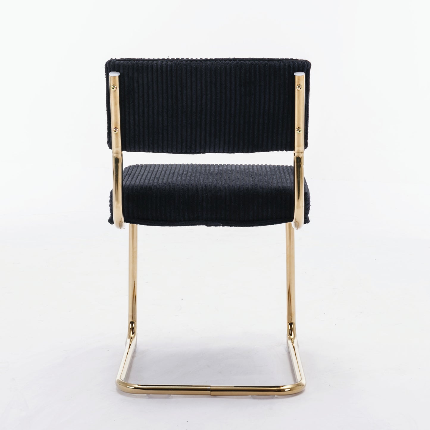 Black corduroy dining chair with polished gold legs