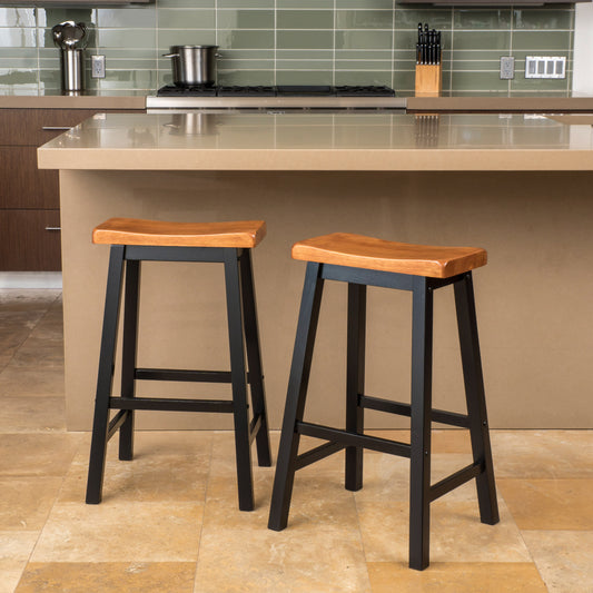Two modern black metal bar stools with natural wood saddle seats