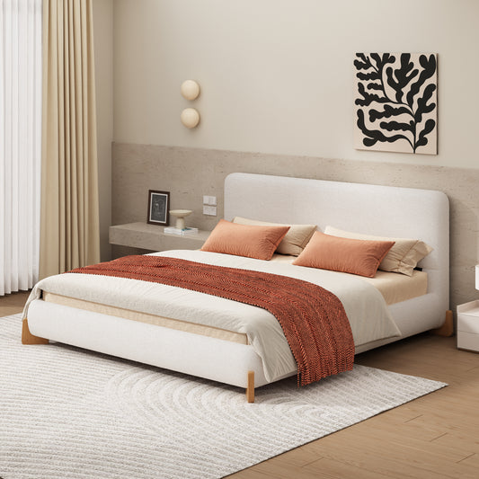 Plush white boucle upholstered bed frame with wooden legs ideal for modern bedrooms