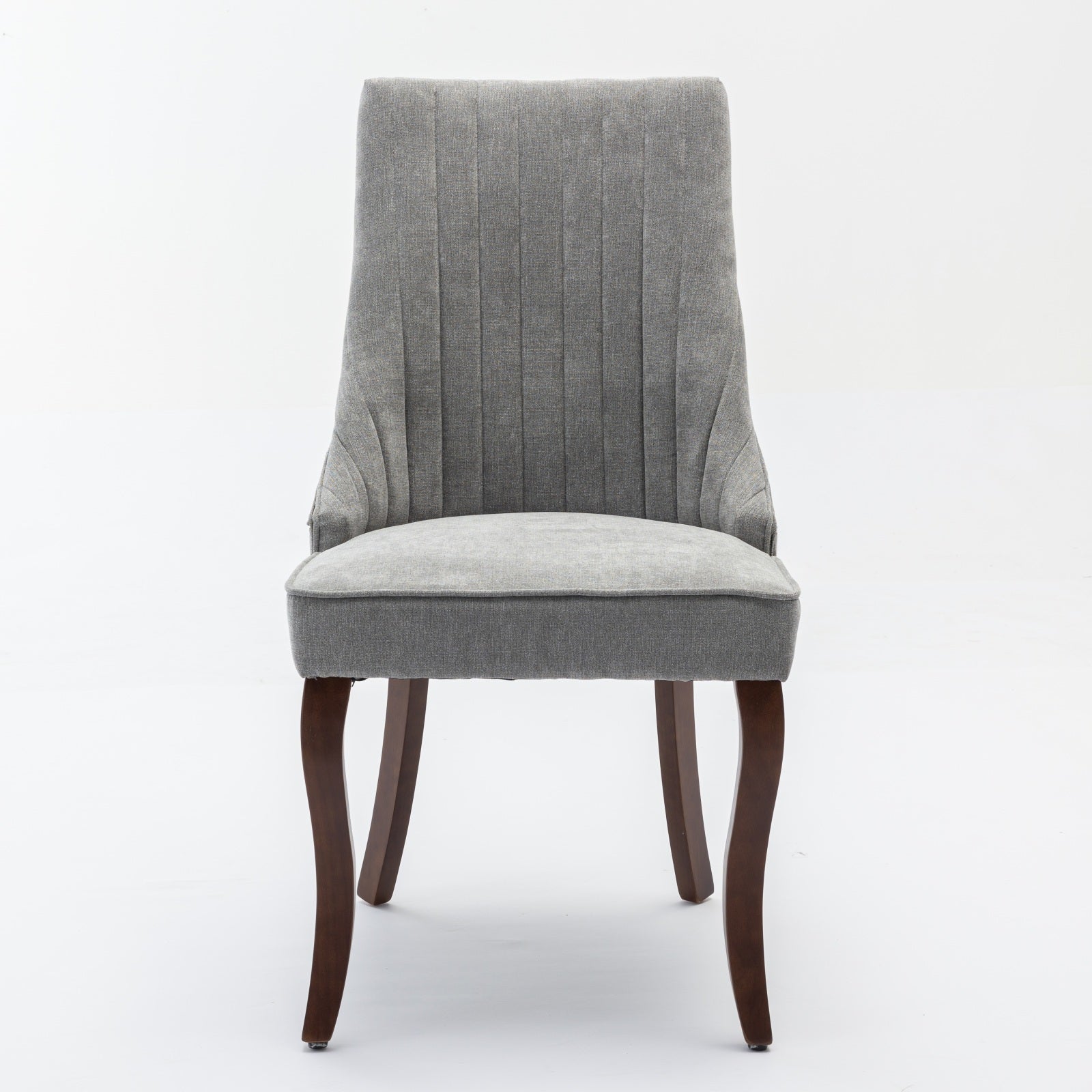 Gray upholstered dining chair with tufted back and curved wooden legs
