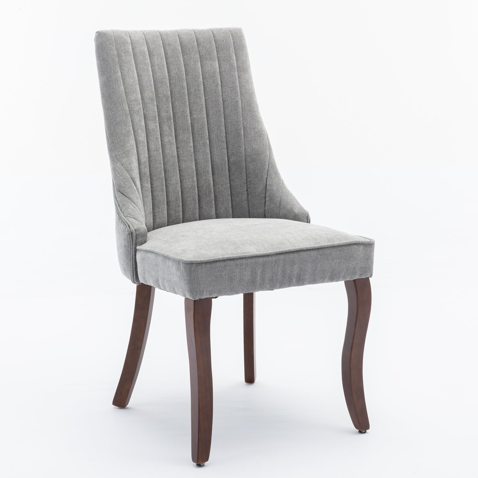 Grey upholstered dining chair with vertical channel tufting and dark wood legs