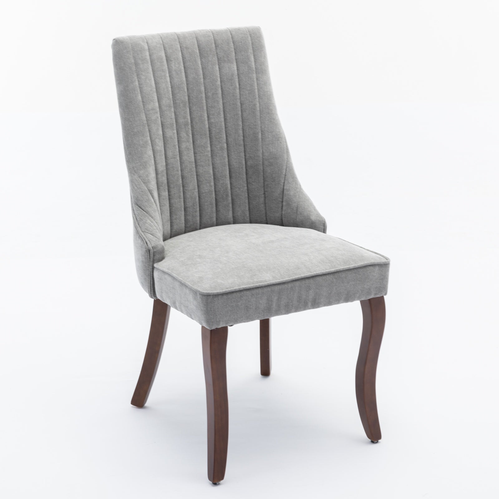Elegant gray velvet accent chair with channel tufted back and dark wood legs