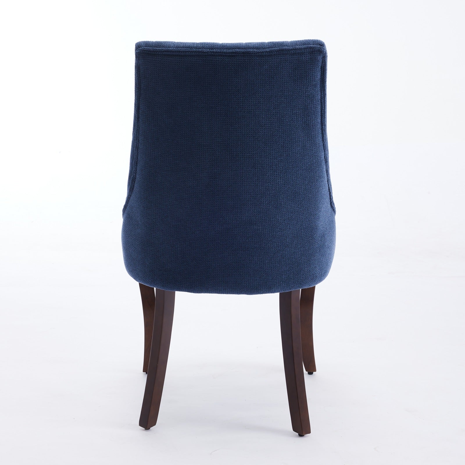 Dark blue upholstered dining chair with dark wood legs