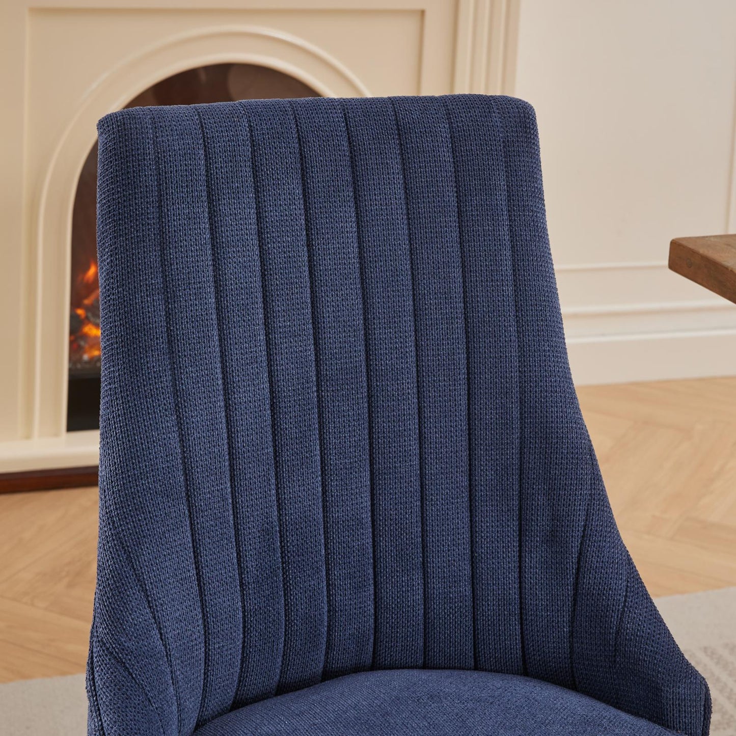 Navy blue fabric dining chair with vertical ribbed detailing
