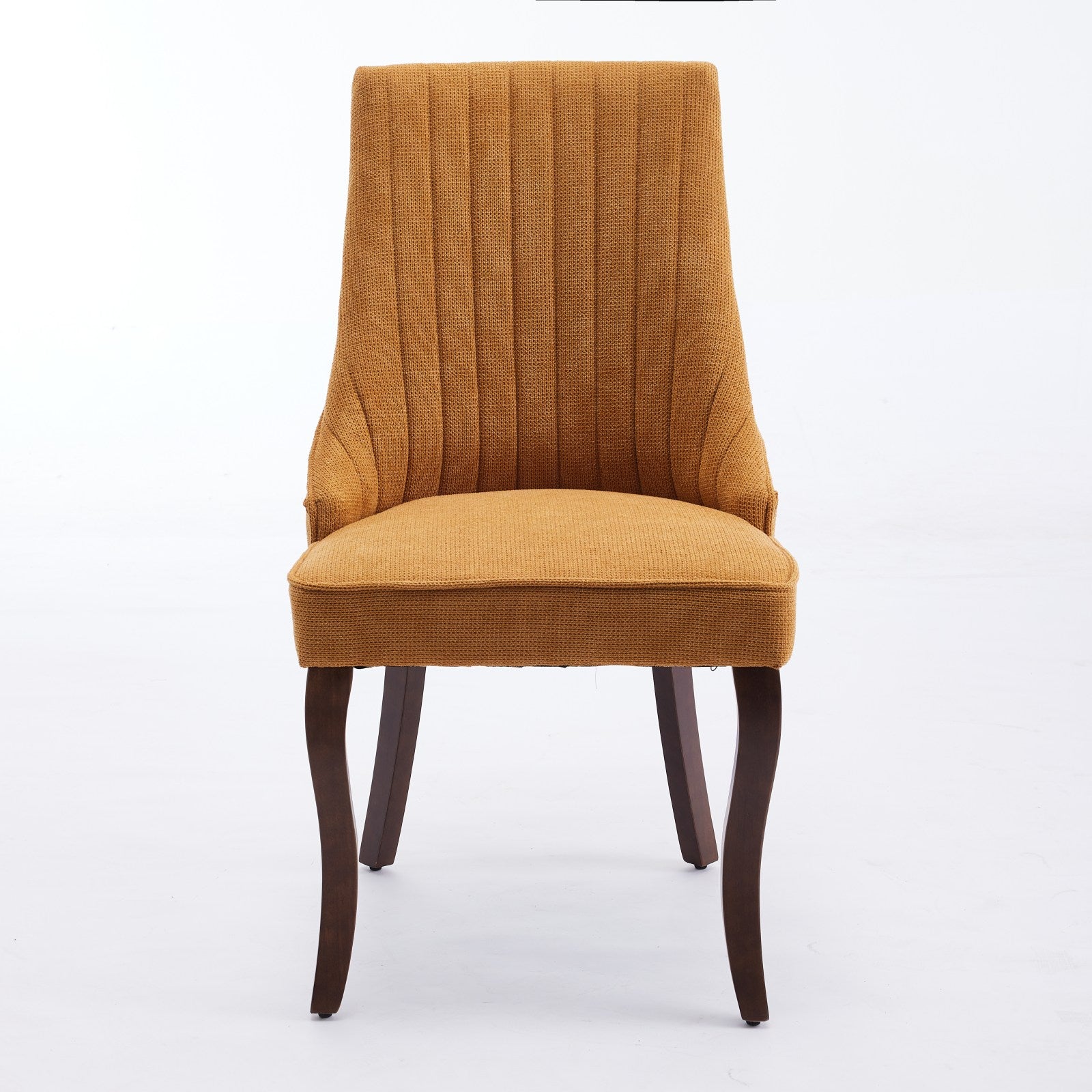 Orange upholstered dining chair with vertical channel tufting and dark wood legs