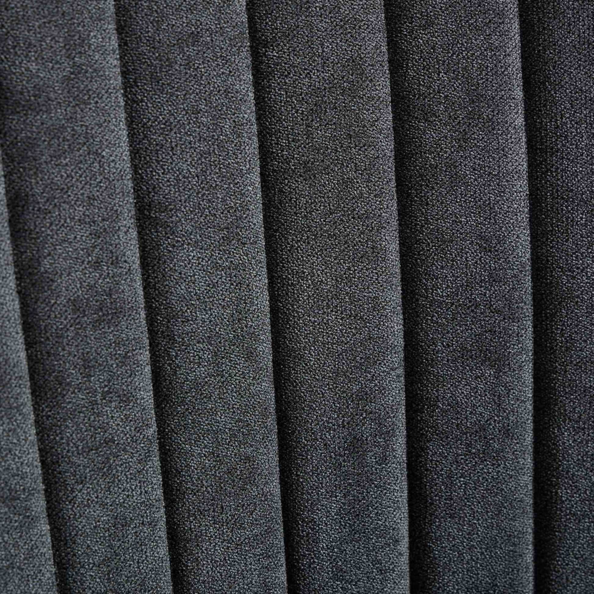 Dark grey channeled upholstery fabric texture