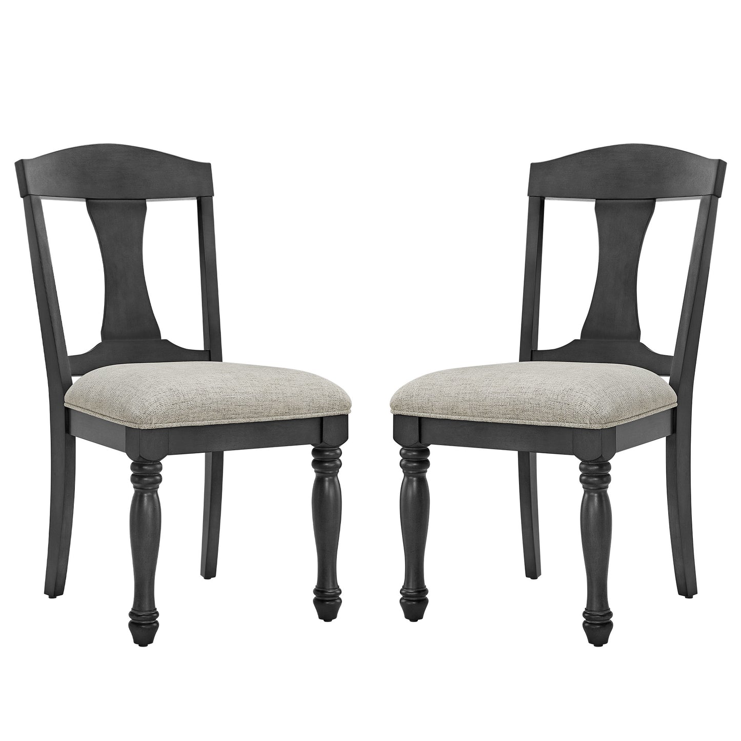 Two upholstered dining chairs with dark wood frames and carved legs