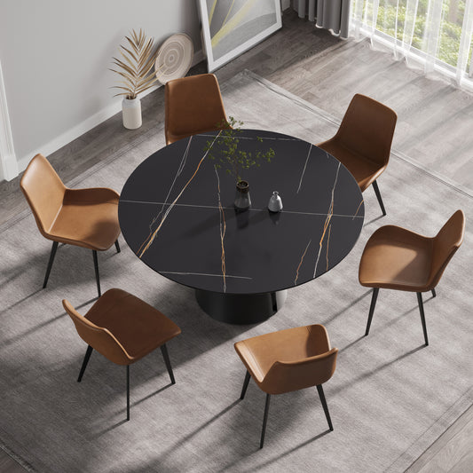 Black marble dining table with gold veining and six brown leather chairs