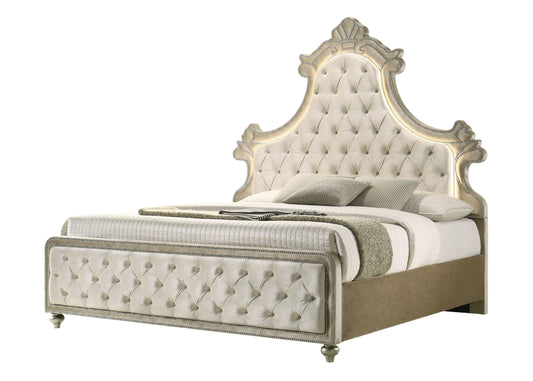 Elegant tufted velvet bed frame in cream with ornate silver nailhead trim and LED lighting