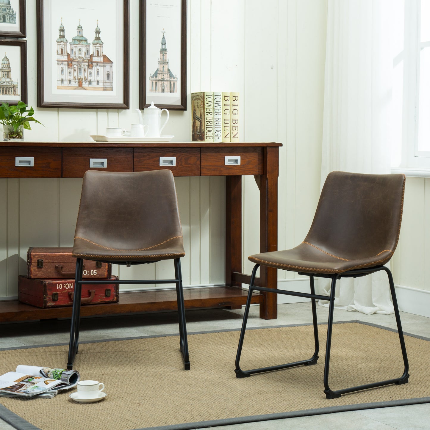 Brown faux leather dining chair with stitched details and black metal legs