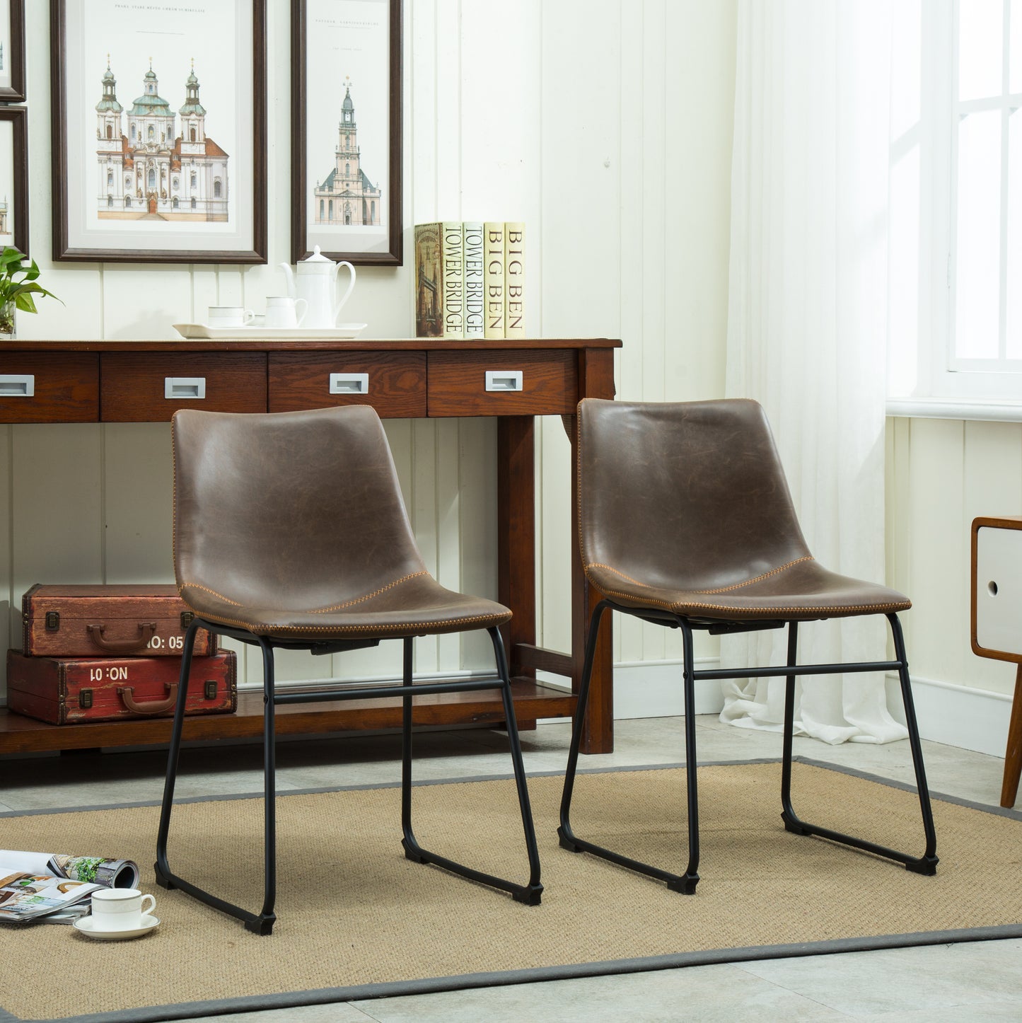 Brown faux leather accent chair with stitched details and black metal legs