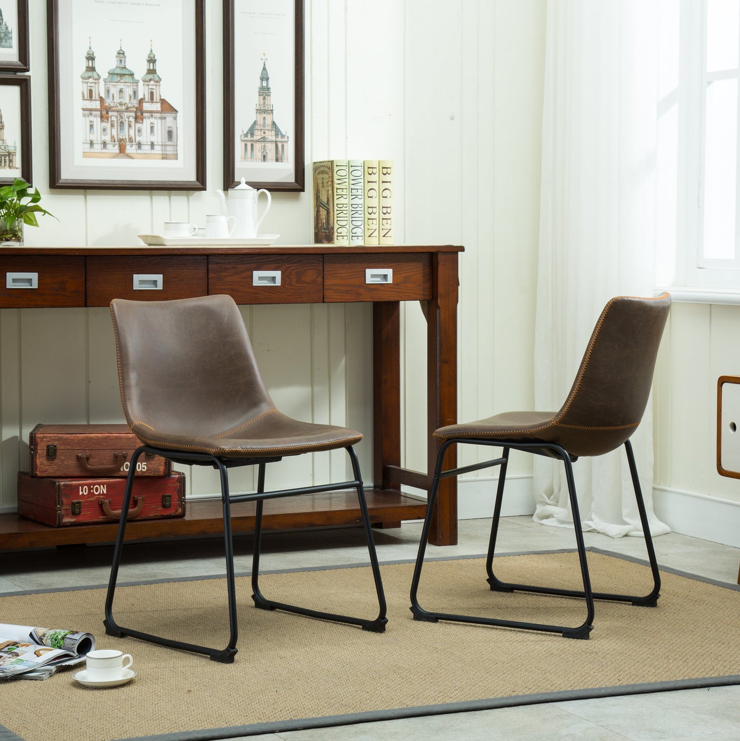 Brown faux leather dining chair with orange stitching