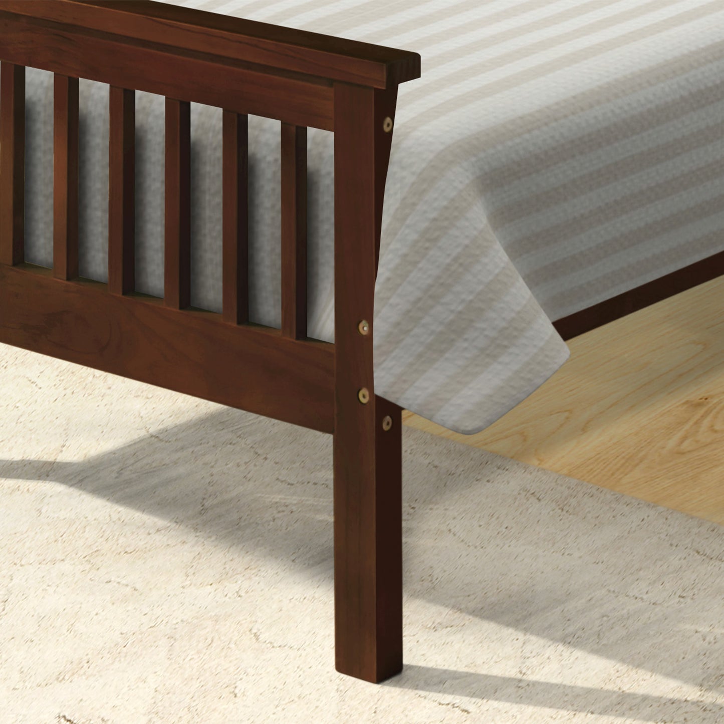 Dark brown wood slatted headboard of a bed frame