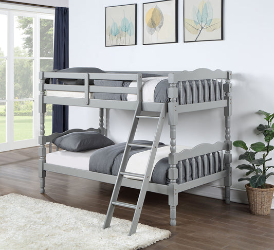 Gray wooden twin over twin bunk bed with white linens and gray pillows