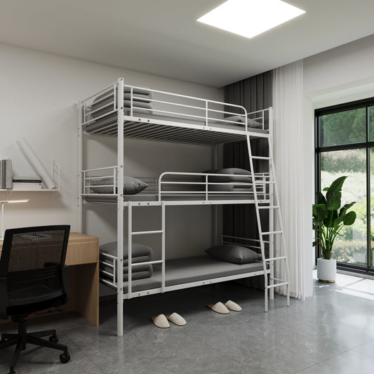 White metal triple bunk bed with grey mattresses and pillows