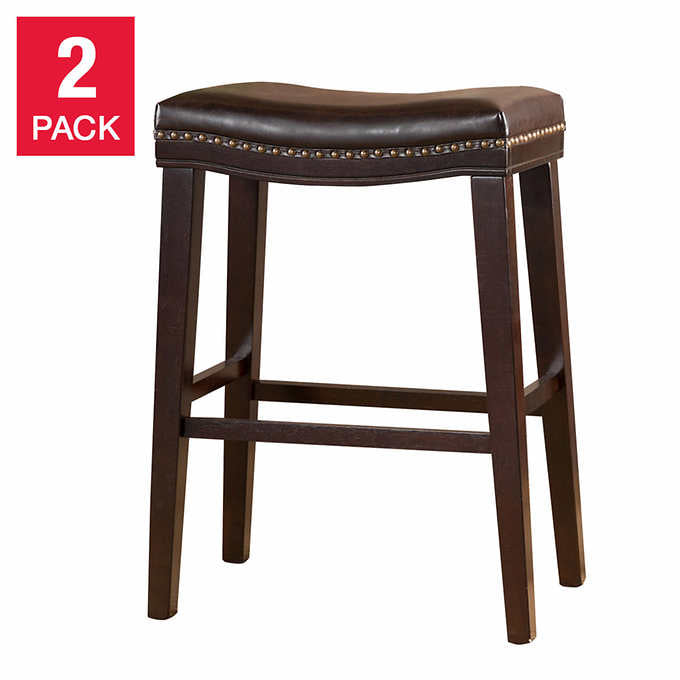 Dark brown leather saddle bar stool with nailhead trim and wooden legs