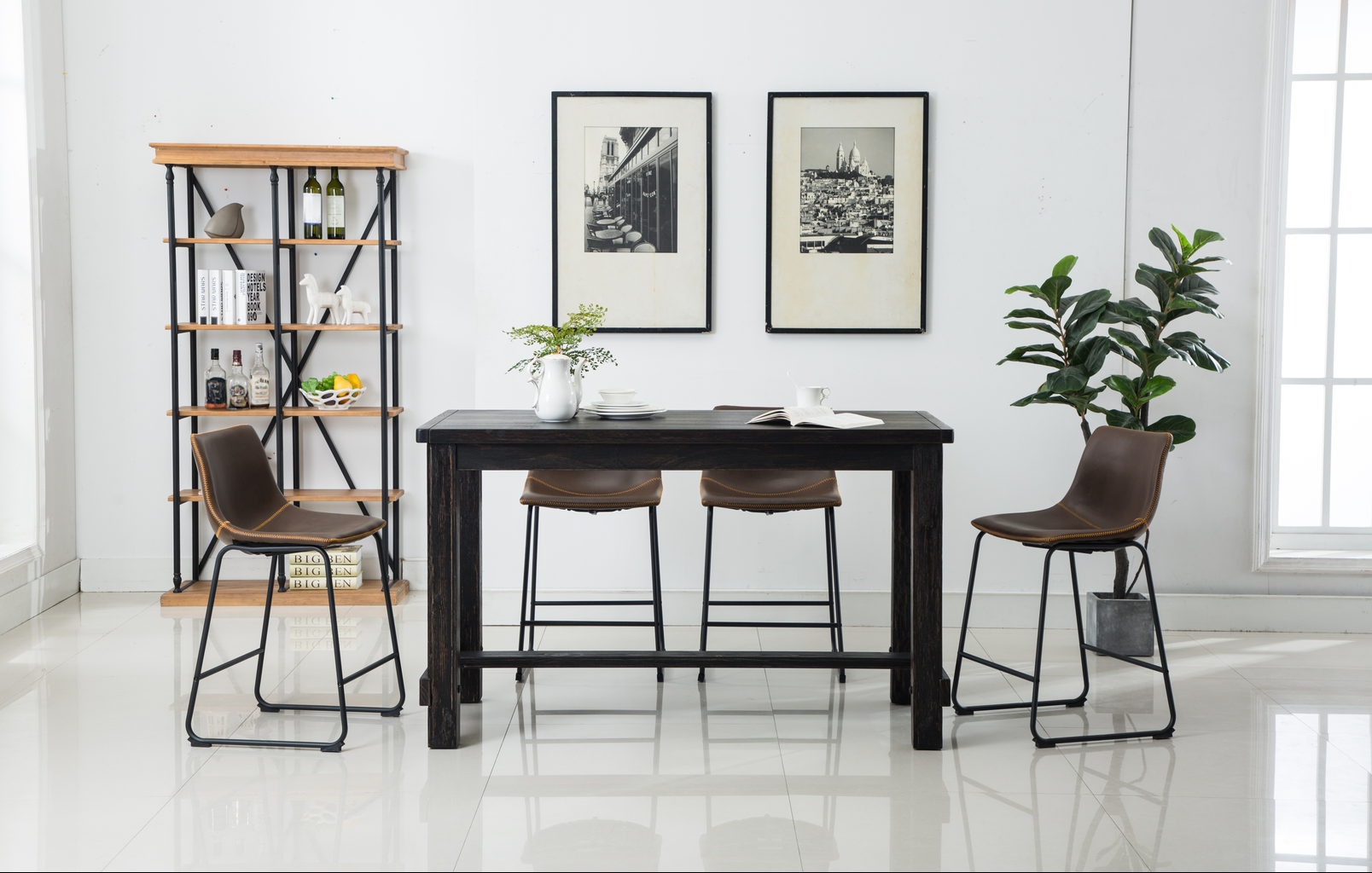 Dark wood industrial bar table with black metal legs and brown stitched stools